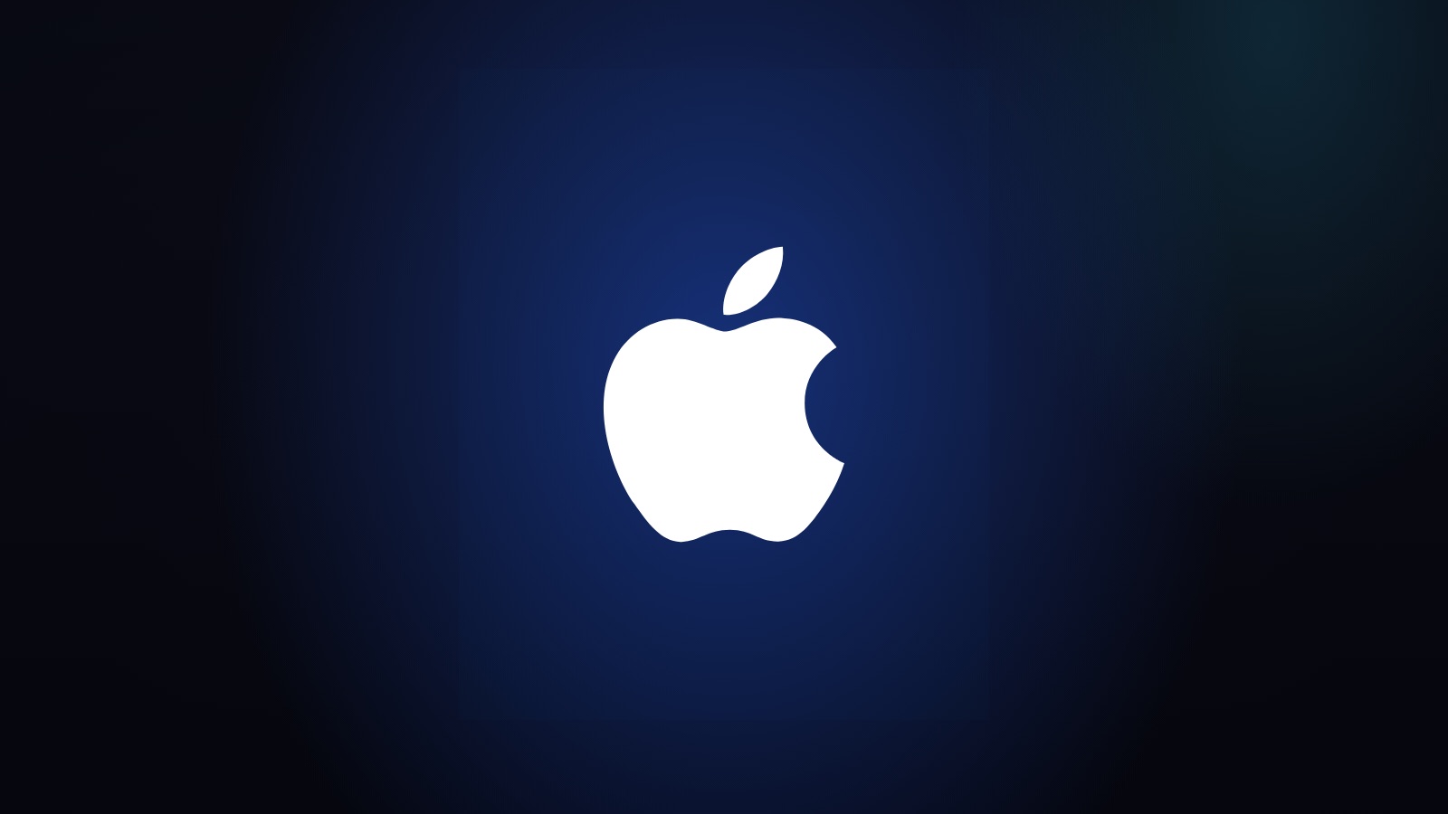 The Apple logo in white, lit by the Stellar blue glow